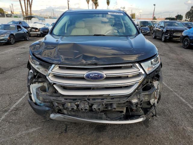 Photo 5 from auction – 2015 FORD EDGE TITAN with VIN 2FMTK3K84FBB07986