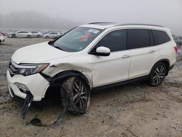 HONDA PILOT TOUR 2016 with VIN 5FNYF6H9XGB076618 - Photo from auction