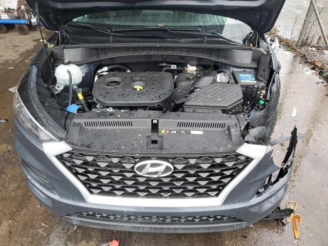 Photo 11 from auction – 2020 HYUNDAI TUCSON SE with VIN KM8J2CA47LU104446