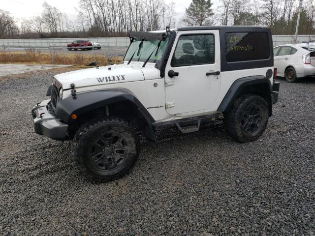 JEEP WRANGLER S 2015 with VIN 1C4AJWAG6FL650216 - Photo from auction