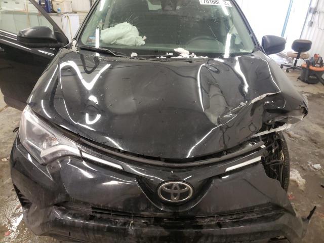 Photo 12 from auction – 2018 TOYOTA RAV4 LE with VIN 2T3BFREV0JW750284