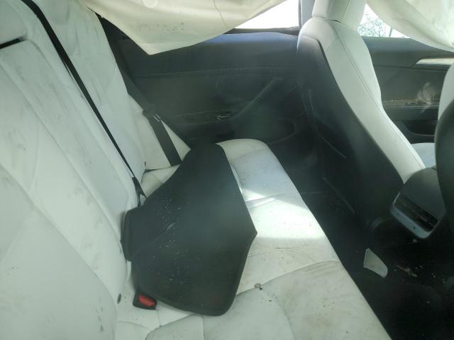 Photo 10 from auction – 2021 TESLA MODEL 3 with VIN 5YJ3E1EBXMF999443