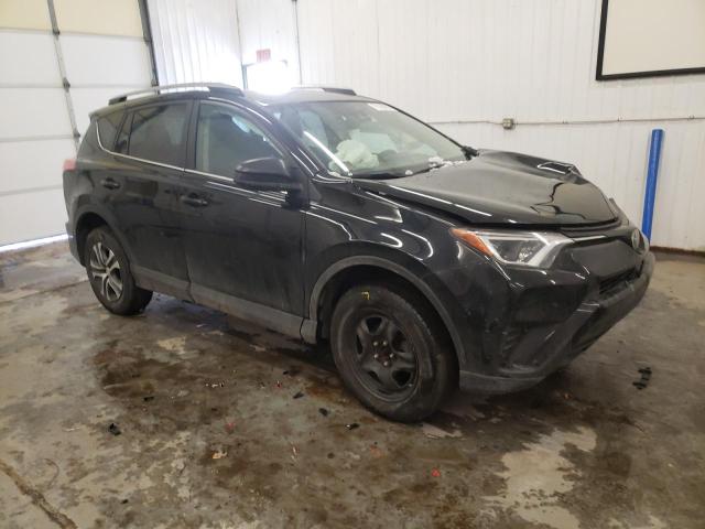 Photo 4 from auction – 2018 TOYOTA RAV4 LE with VIN 2T3BFREV0JW750284