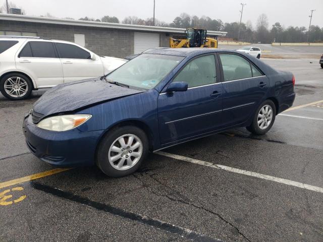TOYOTA CAMRY LE 2002 with VIN JTDBF30K220052596 - Photo from auction