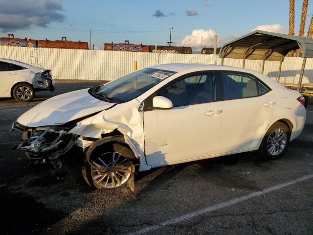 TOYOTA COROLLA L 2014 with VIN 5YFBURHE8EP090593 - Photo from auction