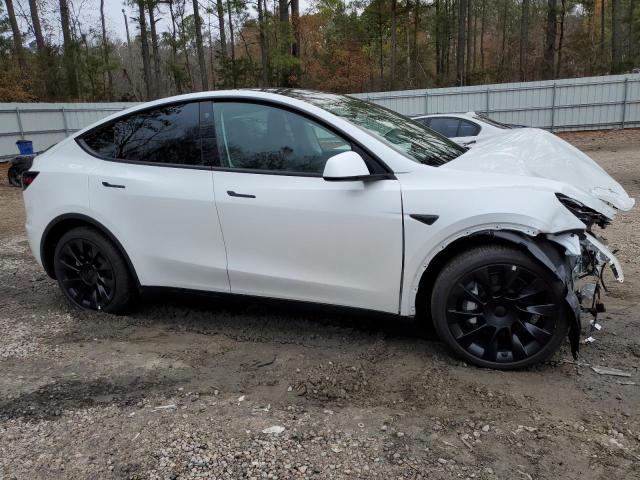 Photo 4 from auction – 2022 TESLA MODEL Y with VIN 7SAYGDEE1NF400915