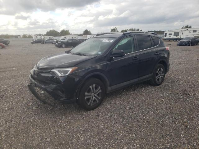 TOYOTA RAV4 LE 2018 with VIN 2T3ZFREV8JW428099 - Photo from auction