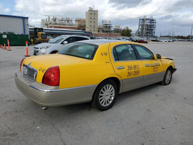 Photo 3 from auction – 2004 LINCOLN TOWN CAR E with VIN 1LNHM81W74Y606794