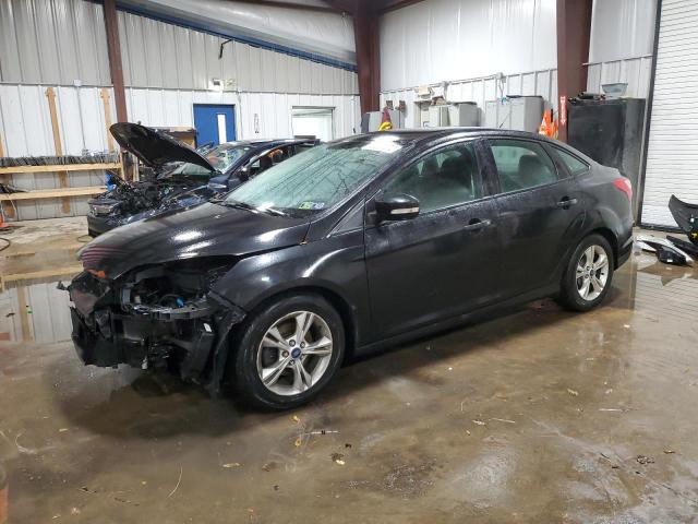 FORD FOCUS SE 2014 with VIN 1FADP3F25EL166856 - Photo from auction
