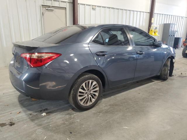 Photo 3 from auction – 2017 TOYOTA COROLLA LE with VIN 5YFBPRHEXHP703132