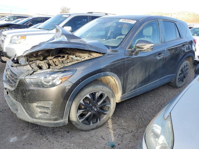 MAZDA CX-5 GT 2016 with VIN JM3KE4DY4G0636472 - Photo from auction