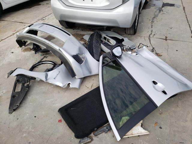 Photo 12 from auction – 2014 TOYOTA PRIUS C with VIN JTDKDTB3XE1064358