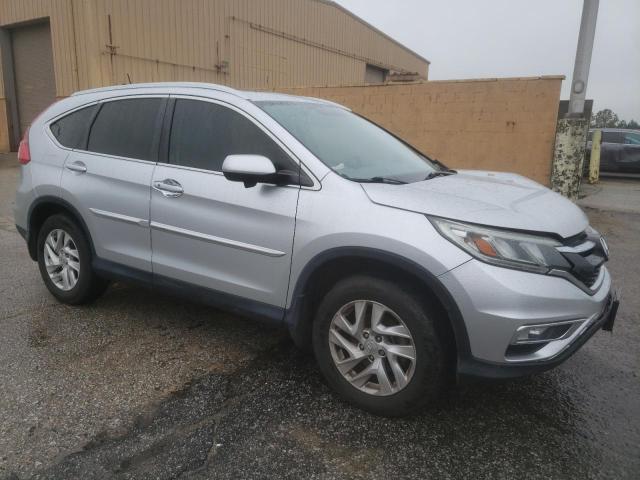 Photo 4 from auction – 2016 HONDA CR-V EXL with VIN 2HKRM3H79GH508804