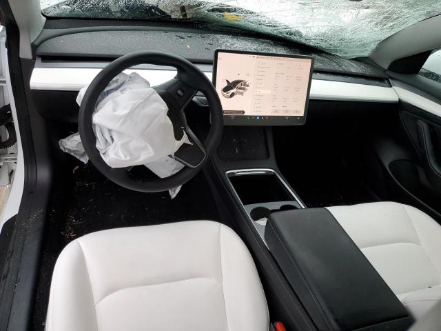 Photo 8 from auction – 2021 TESLA MODEL 3 with VIN 5YJ3E1EB2MF033474