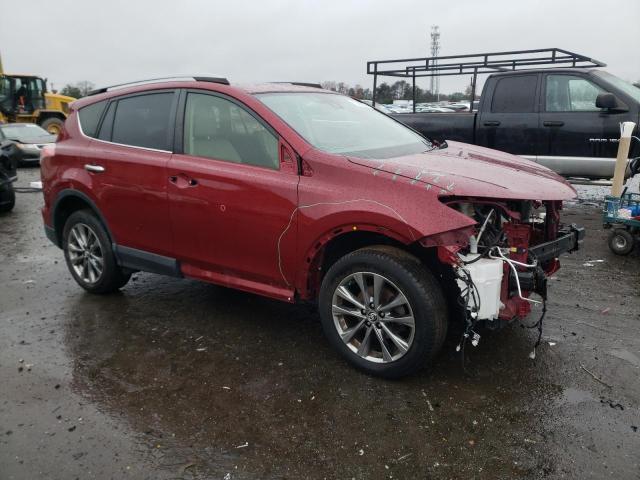 Photo 4 from auction – 2018 TOYOTA RAV4 LIMIT with VIN JTMDFREV1JD230164