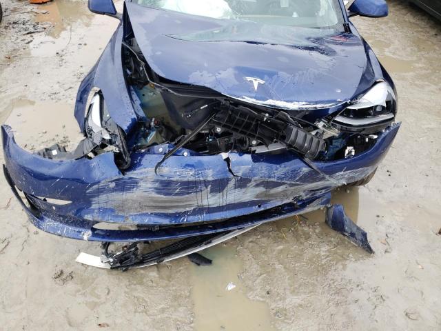 Photo 11 from auction – 2022 TESLA MODEL 3 with VIN 5YJ3E1EA5NF188724