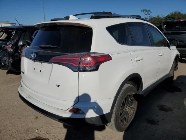 Photo 3 from auction – 2018 TOYOTA RAV4 SE with VIN JTMNFREV4JD128281