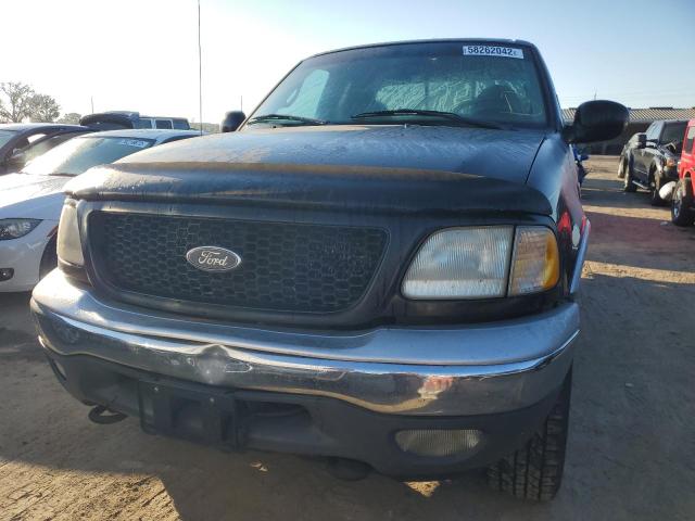 Photo 5 from auction – 2000 FORD F150 with VIN 1FTRX18L9YNB79421