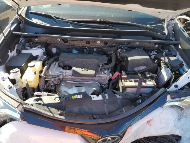 Photo 11 from auction – 2018 TOYOTA RAV4 SE with VIN JTMNFREV4JD128281