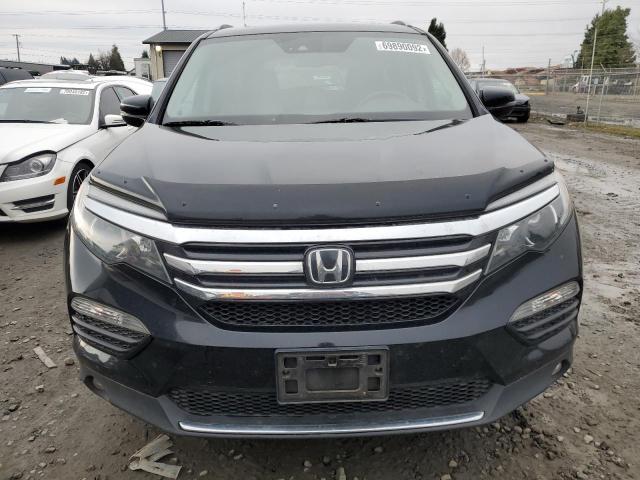 Photo 5 from auction – 2017 HONDA PILOT ELIT with VIN 5FNYF6H05HB037289