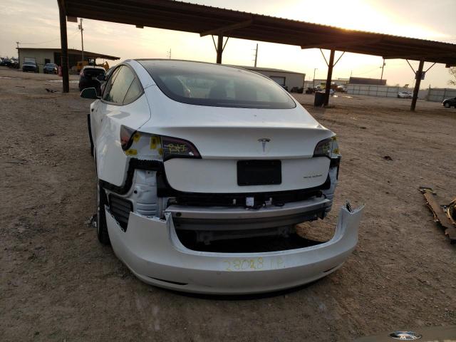 Photo 6 from auction – 2022 TESLA MODEL 3 with VIN 5YJ3E1EB2NF195736