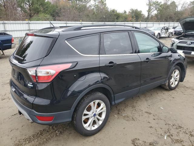 Photo 3 from auction – 2017 FORD ESCAPE SE with VIN 1FMCU9GDXHUC37657