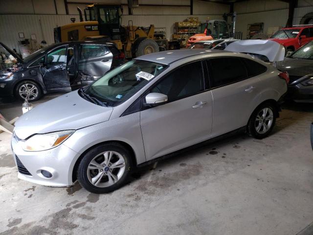 FORD FOCUS SE 2014 with VIN 1FADP3F21EL166319 - Photo from auction