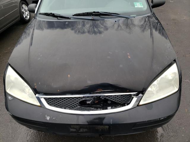 Photo 11 from auction – 2005 FORD FOCUS with VIN 3FAFP31N95R118661