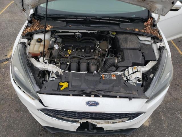 Photo 11 from auction – 2015 FORD FOCUS SE with VIN 1FADP3K24FL290026