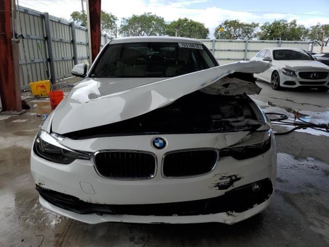 Photo 5 from auction – 2016 BMW 320 I with VIN WBA8E1G59GNT35098