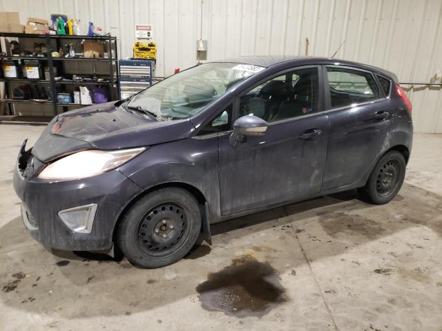 FORD FIESTA SES 2012 with VIN 3FADP4FJ6CM127704 - Photo from auction