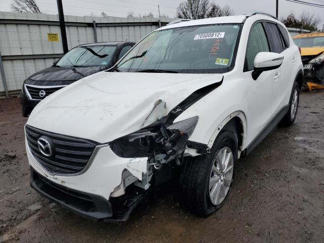 MAZDA CX-5 TOURI 2016 with VIN JM3KE4CY8G0792547 - Photo from auction