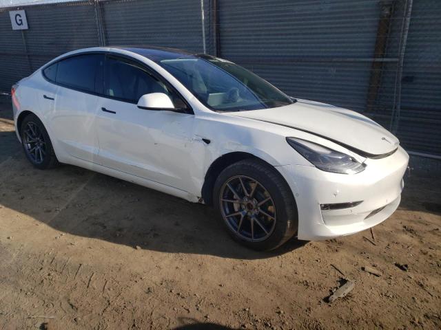 Photo 4 from auction – 2021 TESLA MODEL 3 with VIN 5YJ3E1EB7MF051551