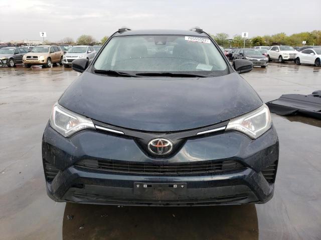 Photo 5 from auction – 2018 TOYOTA RAV4 LE with VIN JTMZFREV5JJ174091