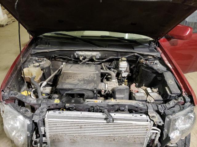 Photo 7 from auction – 2009 FORD ESCAPE LIM with VIN 1FMCU94G59KB61325