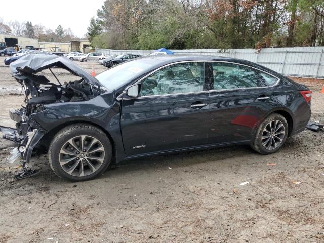 TOYOTA AVALON HYB 2016 with VIN 4T1BD1EB6GU052244 - Photo from auction