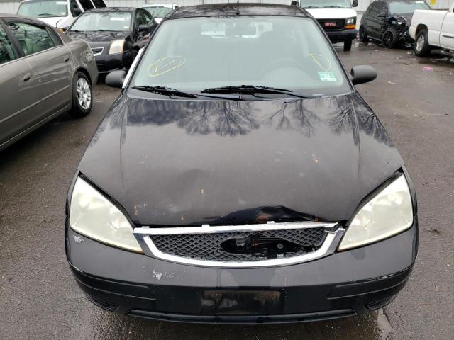 Photo 5 from auction – 2005 FORD FOCUS with VIN 3FAFP31N95R118661
