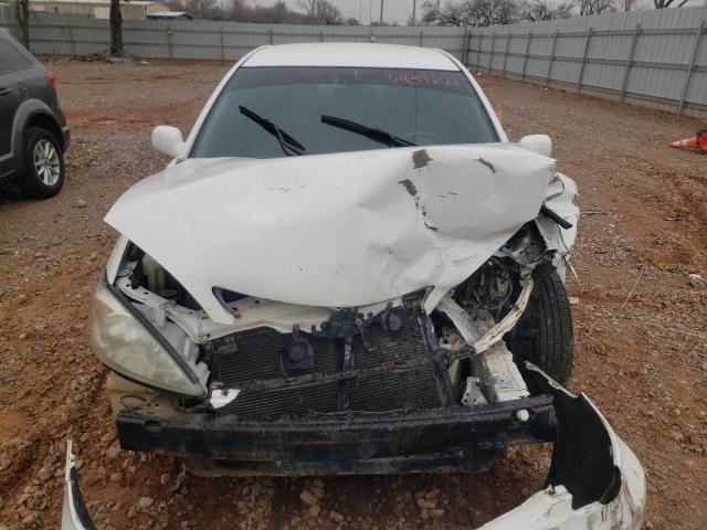 Photo 5 from auction – 2004 TOYOTA CAMRY LE with VIN 4T1BE32K04U313456