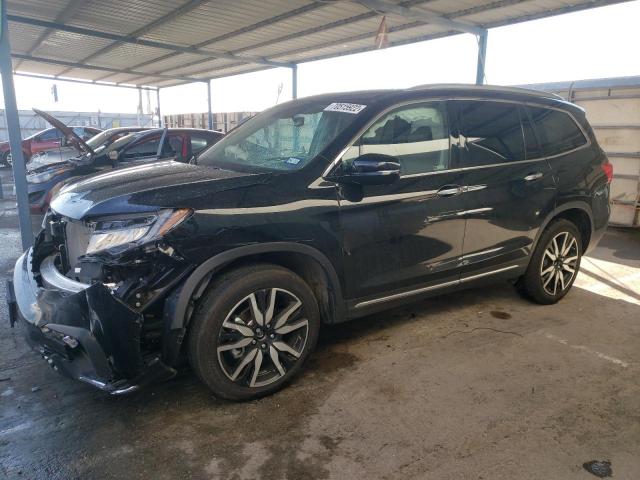 HONDA PILOT TOUR 2022 with VIN 5FNYF5H64NB013382 - Photo from auction