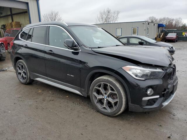 Photo 4 from auction – 2017 BMW X1 XDRIVE2 with VIN WBXHT3C35H5F78861