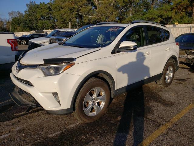 TOYOTA RAV4 XLE 2016 with VIN JTMWFREV2GJ086014 - Photo from auction