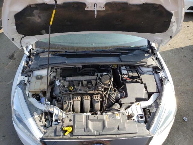 Photo 11 from auction – 2015 FORD FOCUS S with VIN 1FADP3E26FL261557