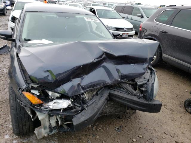 Photo 5 from auction – 2014 VOLKSWAGEN PASSAT S with VIN 1VWAT7A37EC103755