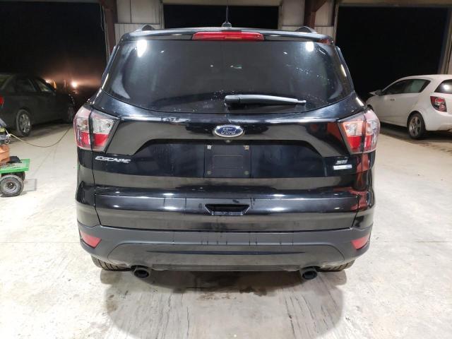 Photo 6 from auction – 2017 FORD ESCAPE SE with VIN 1FMCU9GD7HUD05588