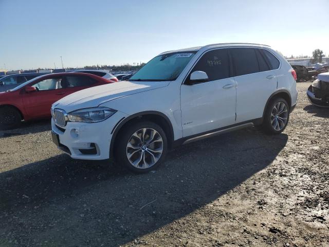BMW X5 XDRIVE5 2015 with VIN 5UXKR6C5XF0J74710 - Photo from auction