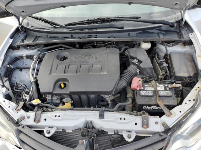 Photo 11 from auction – 2014 TOYOTA COROLLA L with VIN 2T1BURHEXEC027270