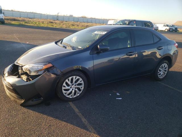TOYOTA COROLLA L 2017 with VIN 5YFBURHE3HP704695 - Photo from auction