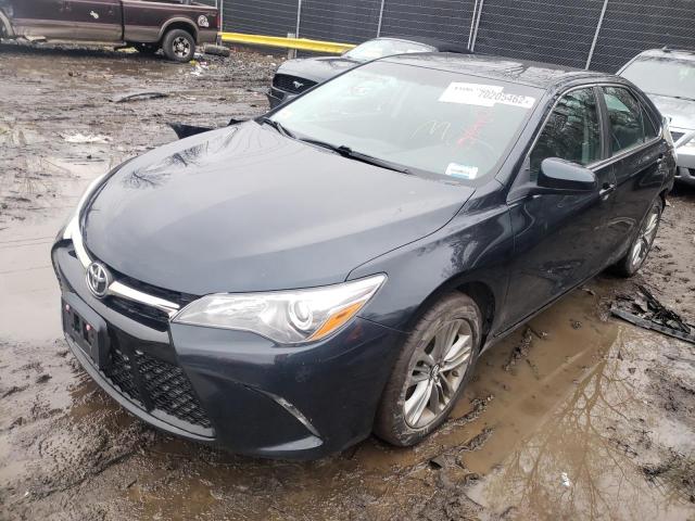 TOYOTA CAMRY LE 2017 with VIN 4T1BF1FK2HU698729 - Photo from auction