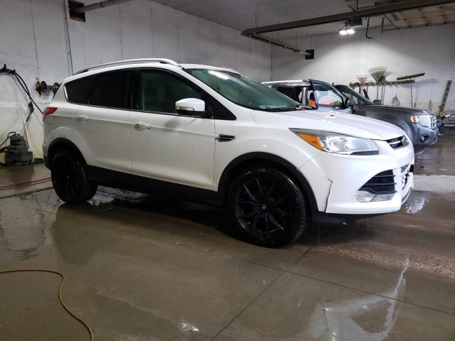 Foto 4 de la subasta – 2014 FORD ESCAPE TIT con VIN 1FMCU0J98EUC06712