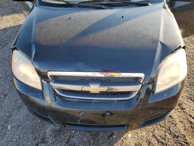 Photo 11 from auction – 2011 CHEVROLET AVEO LS with VIN KL1TD5DE2BB131949